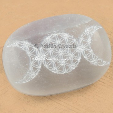 Selenite  moon with flower of life Palm stone